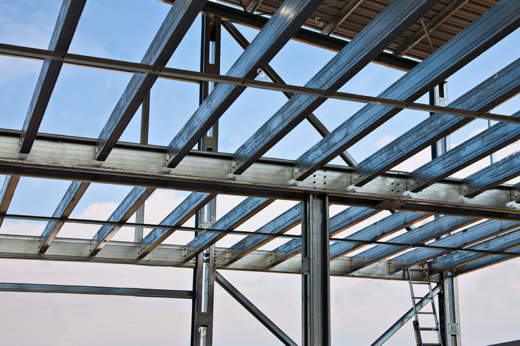 Structural steel frame prepared for intumescent coating