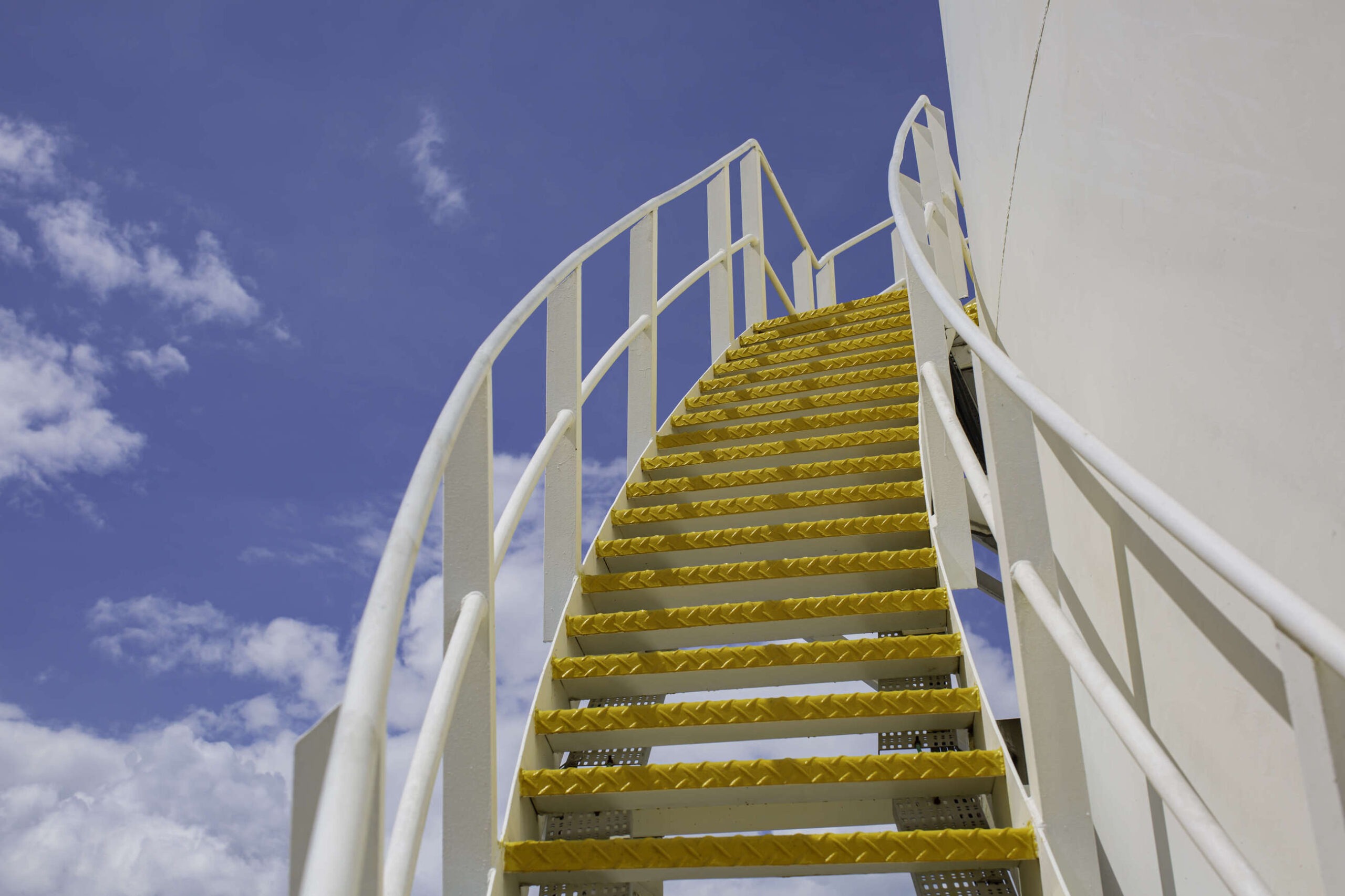 External safety staircase sprayed yellow