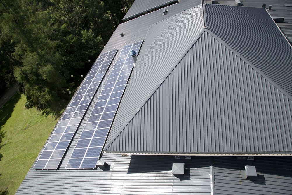 Industrial roof being spray-coated on site